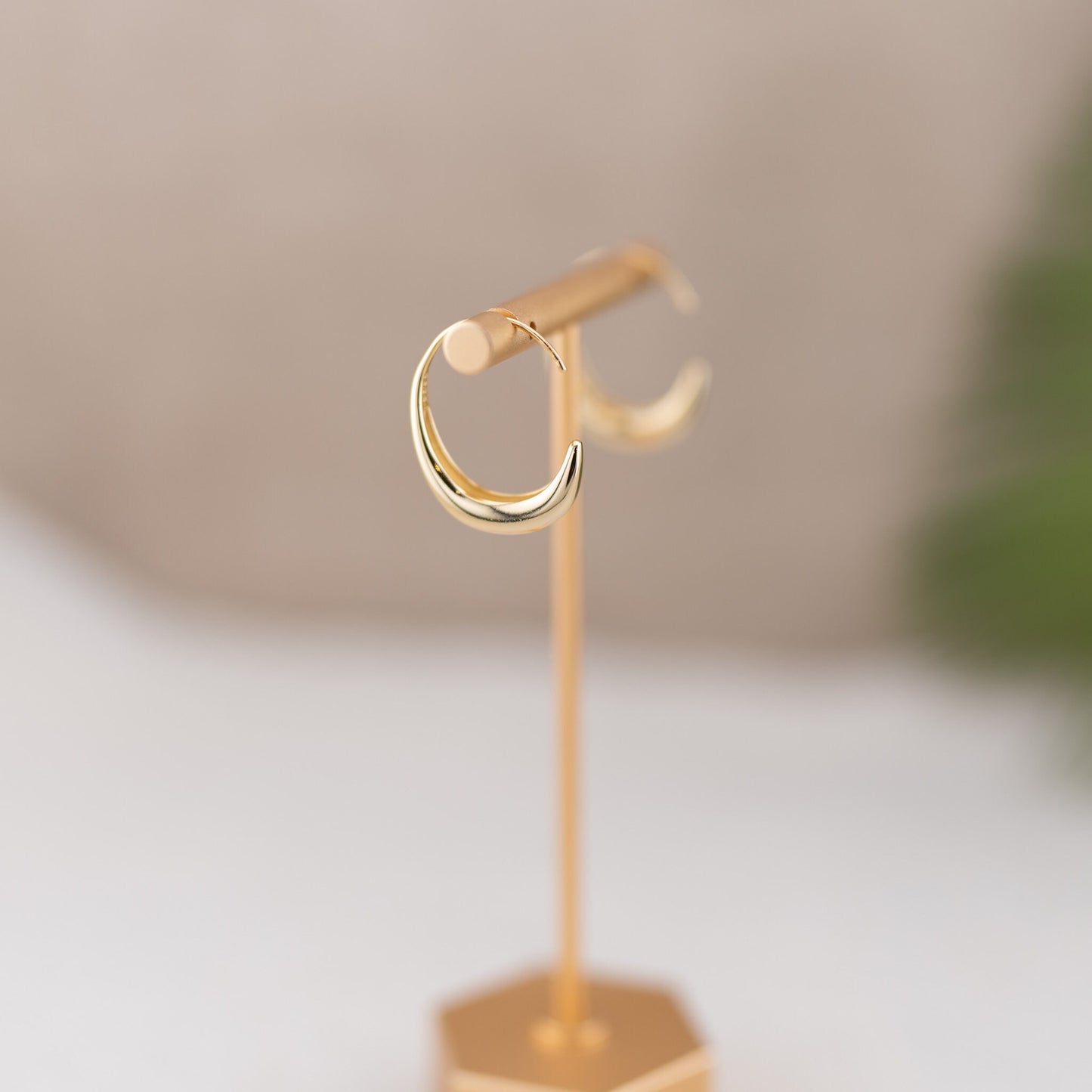 Medium chunky open gold hoop earrings