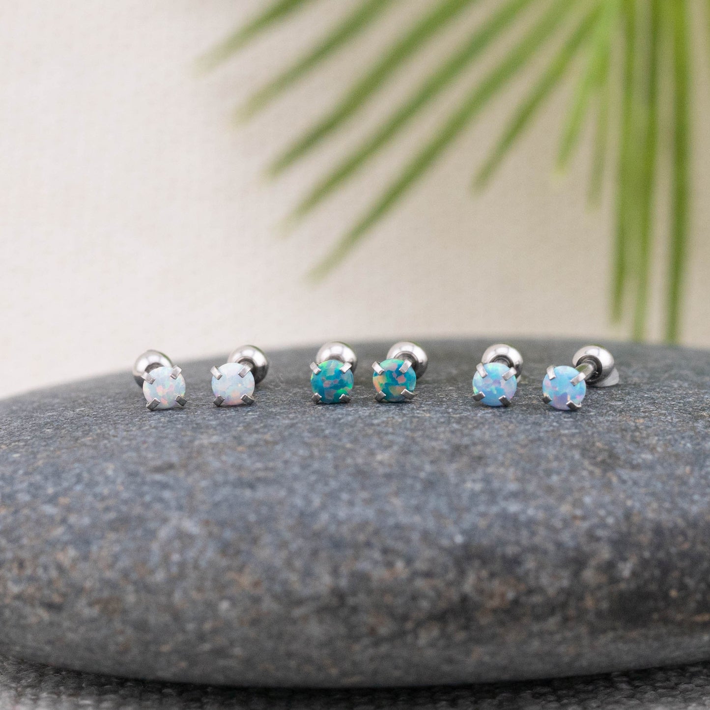 Small fire opal screw back titanium piercing